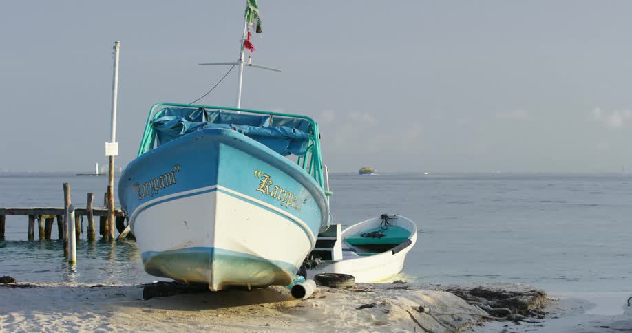 Two boats on the shore