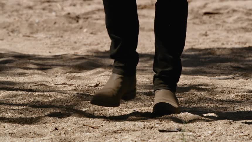 A person is walking outdoors