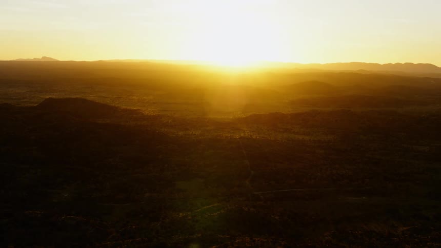 A landscape is displayed while the sun is setting