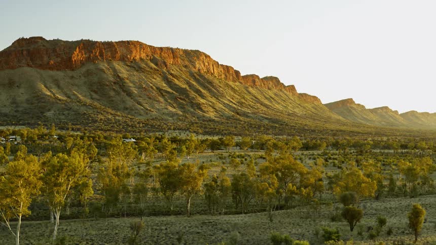 Aerial view of the peaks of a mesa at sunrise