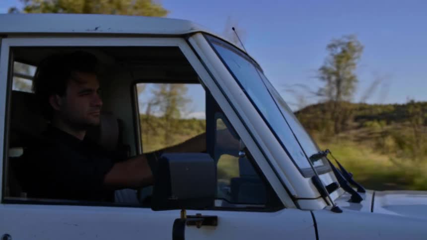 A man driving his truck