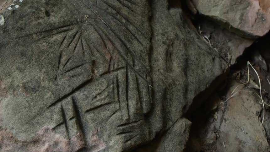 There are carvings all over the stone