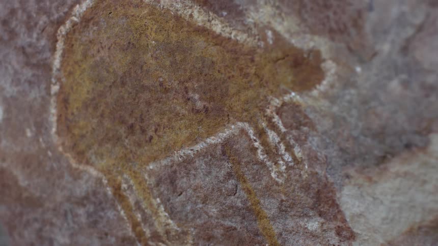 A drawing on a rock