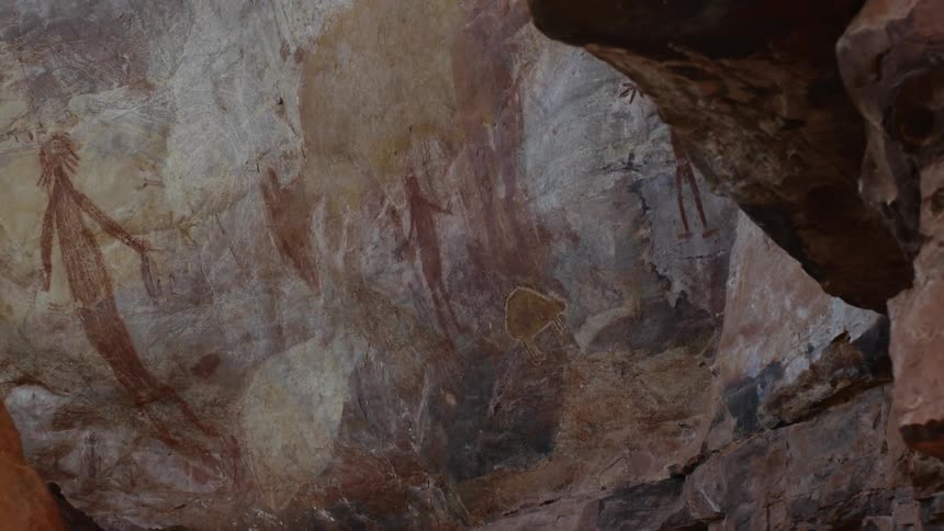Cave drawings on a rock wall