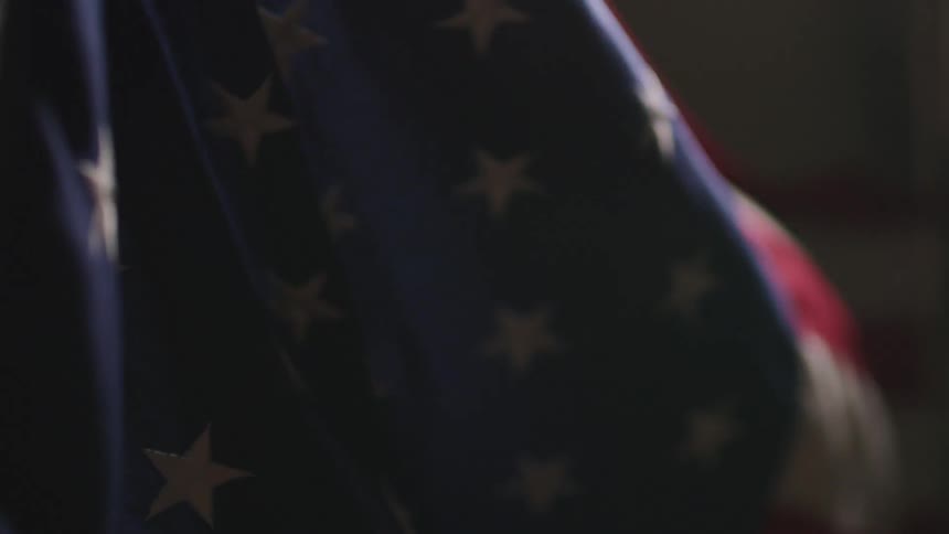 The american flag blowing in the breeze