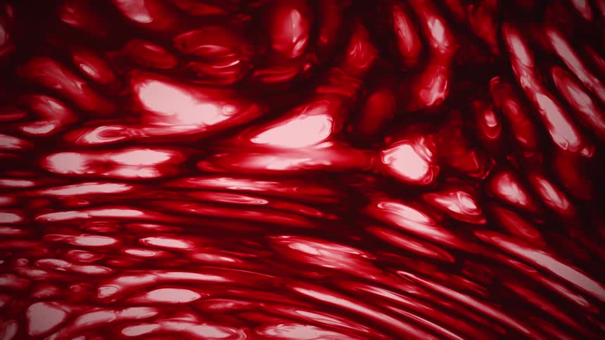 Flowing and rippling red liquid