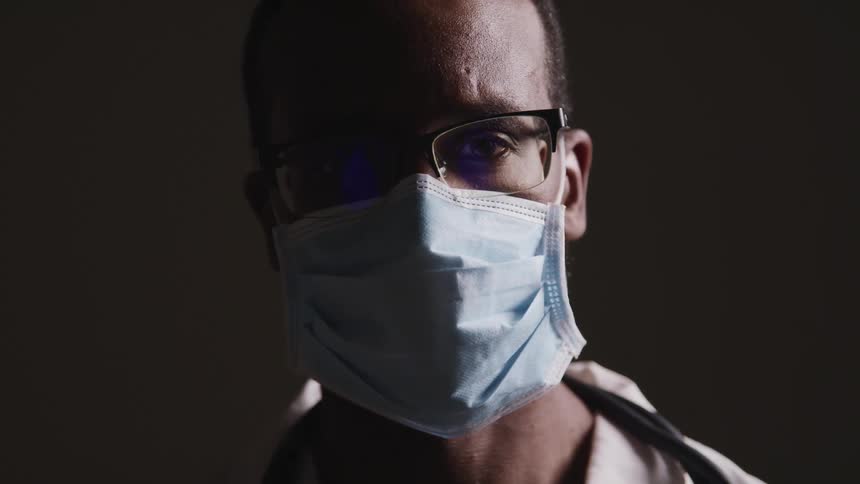 A doctor is examining something