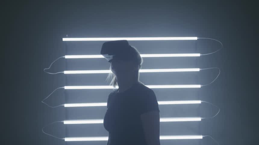 A woman using a virtual reality device