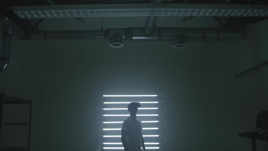 A man with a virtual reality head set on