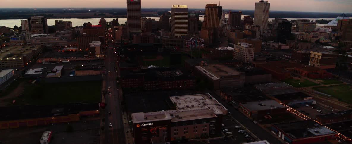 The buildings are lit at sunset