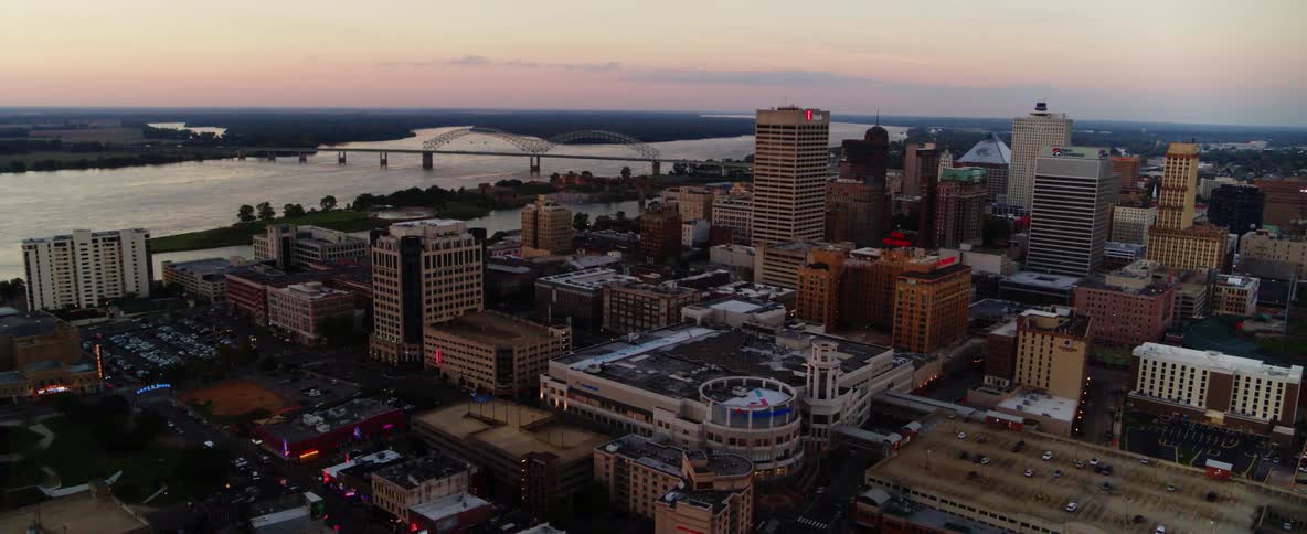 An aerial view of a downtown city is displayed