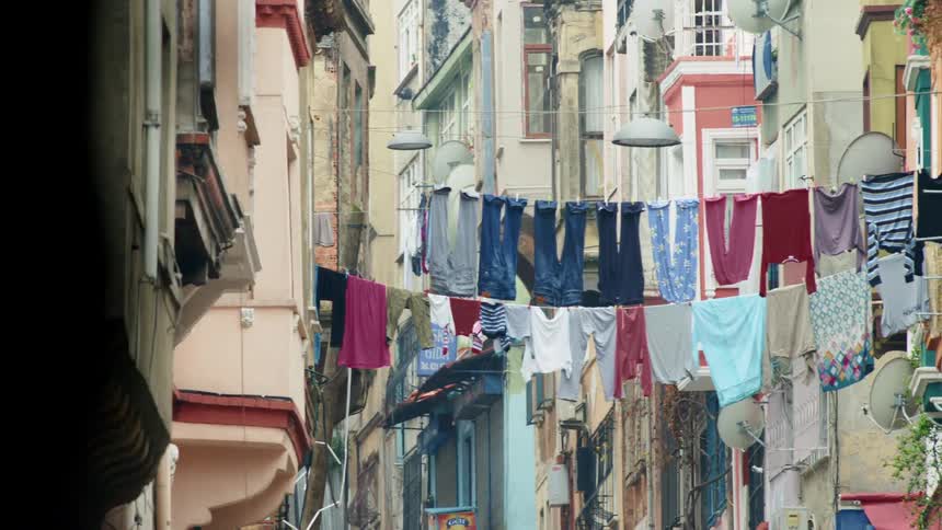 Laundry hanging between homes in a primitive area