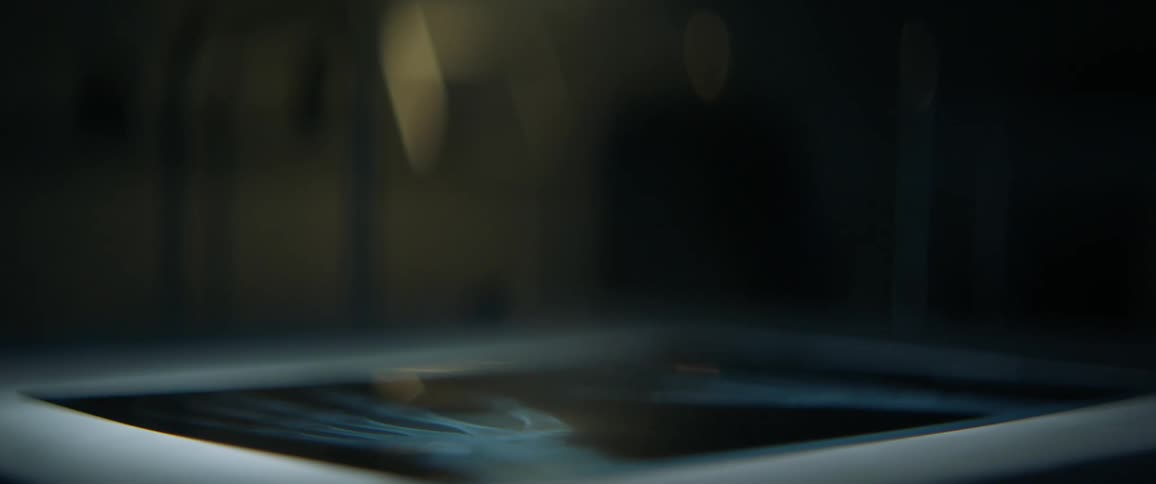 A person adjusts a x-ray film