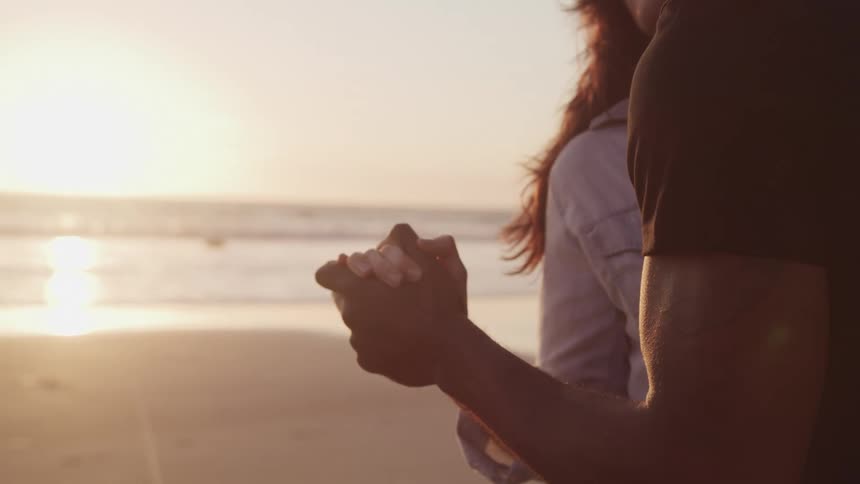 A couple dancing on the beach