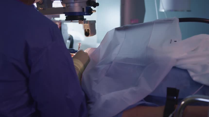 A doctor performing surgery