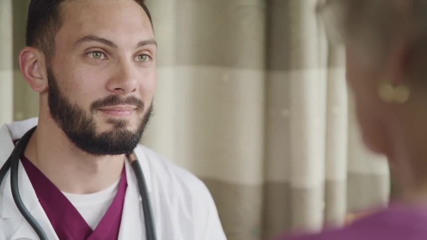 A doctor talks to a patient