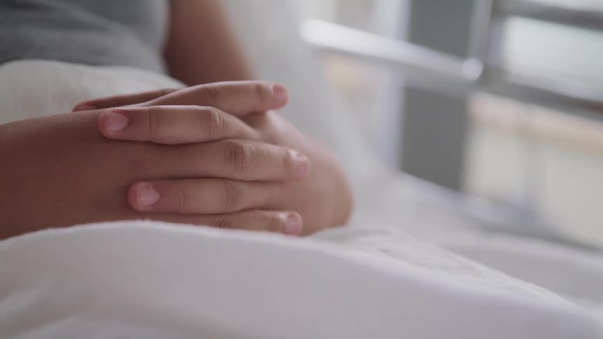 A patient in a hospital bed