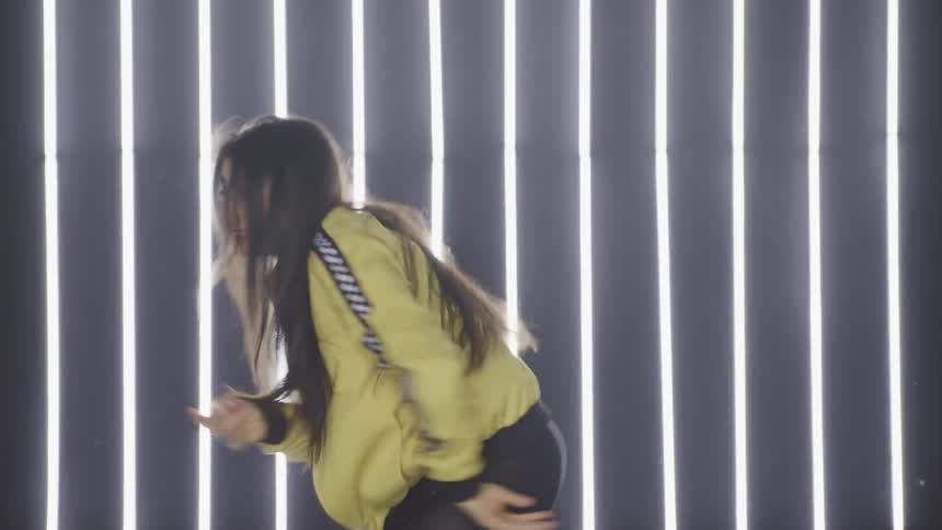 A teenage girl dancing