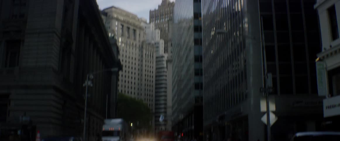 City buildings tower over a street