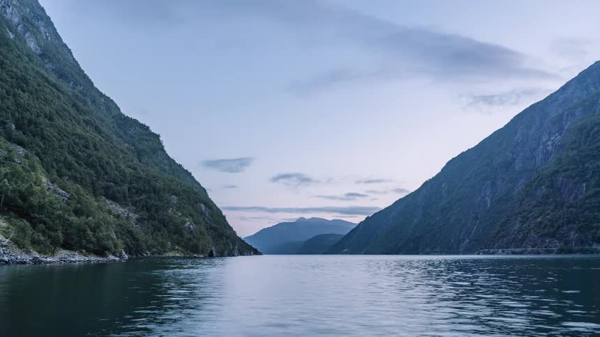 Timelapse of water rippling on a mountain lake at sunrise