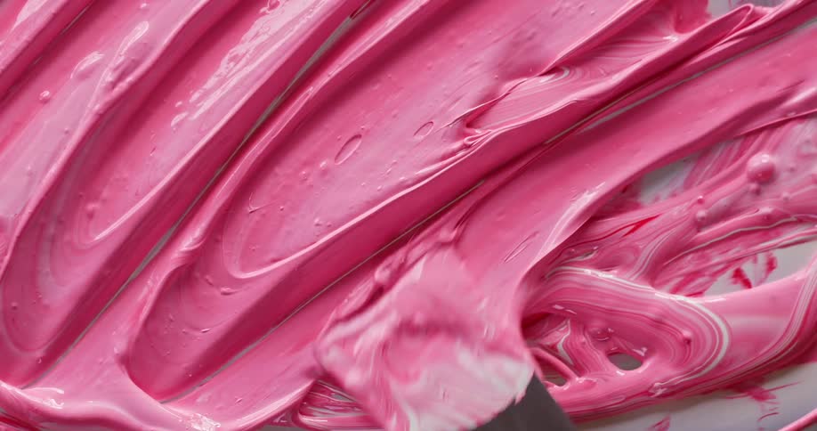 A person is mixing paint