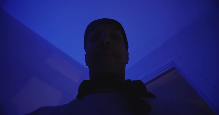 A man is dancing by the window