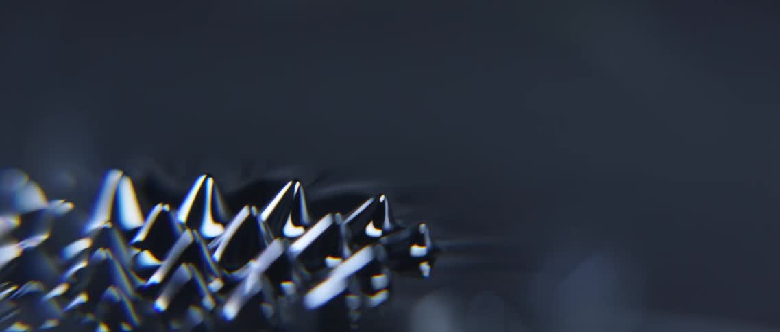 Black gray white and silver colors that look like oil and spikes
