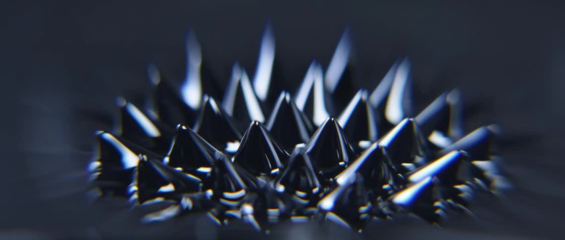 Fluid forms black shiny spikes