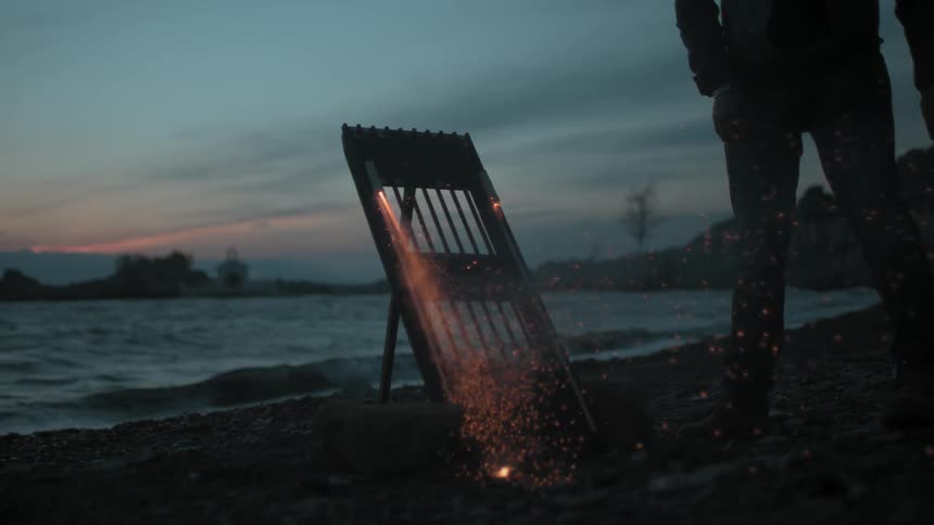 Fireworks taking off on the beach at dusk