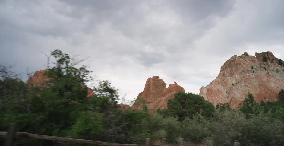 Rock formations stand in the wilderness on a cloudy day