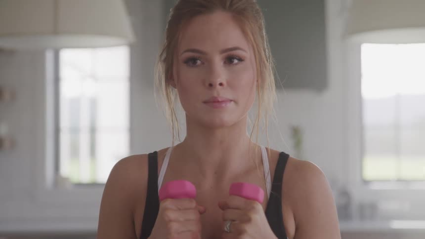 A woman is working out indoors