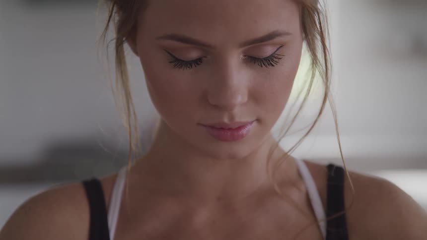 A teenager meditating at home