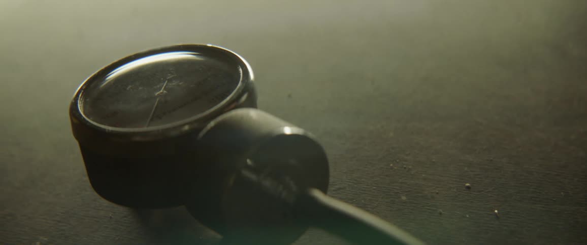 A gauge sits on a counter