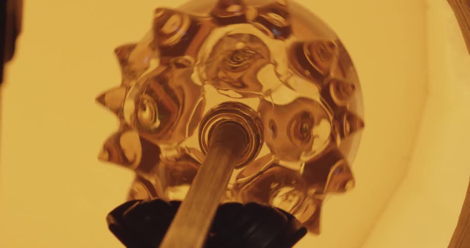 A spiky glass structure rotates