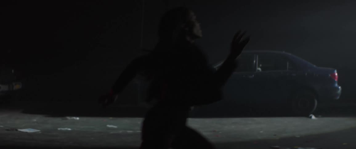 A woman is running at night