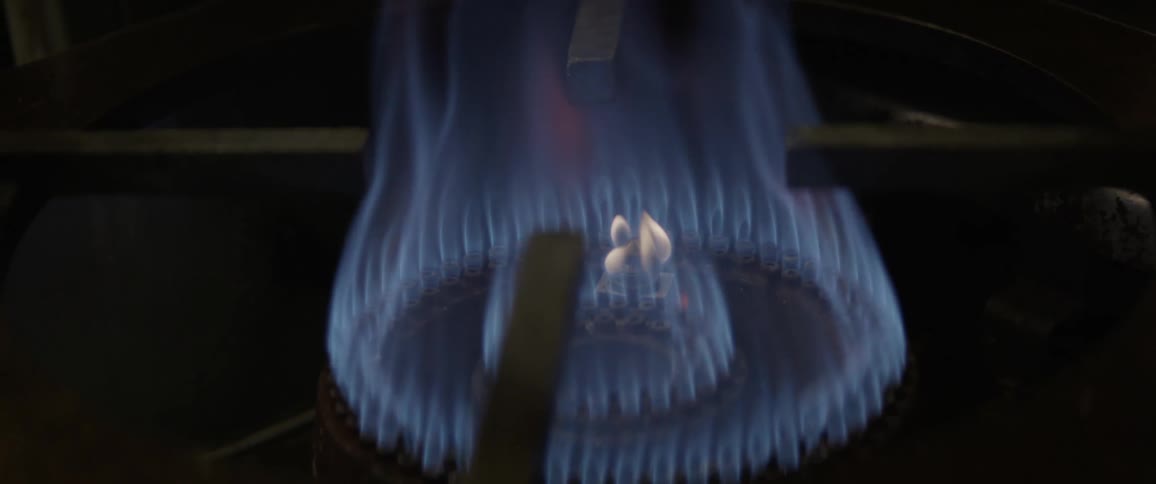 Flames burn from the stove then recede