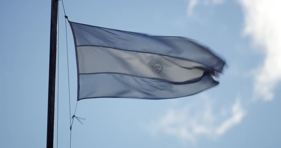 An Argentina flag is blowing in the wind