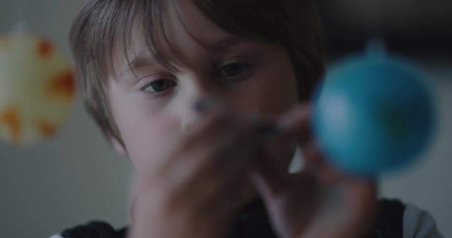 Child plays with airplane top
