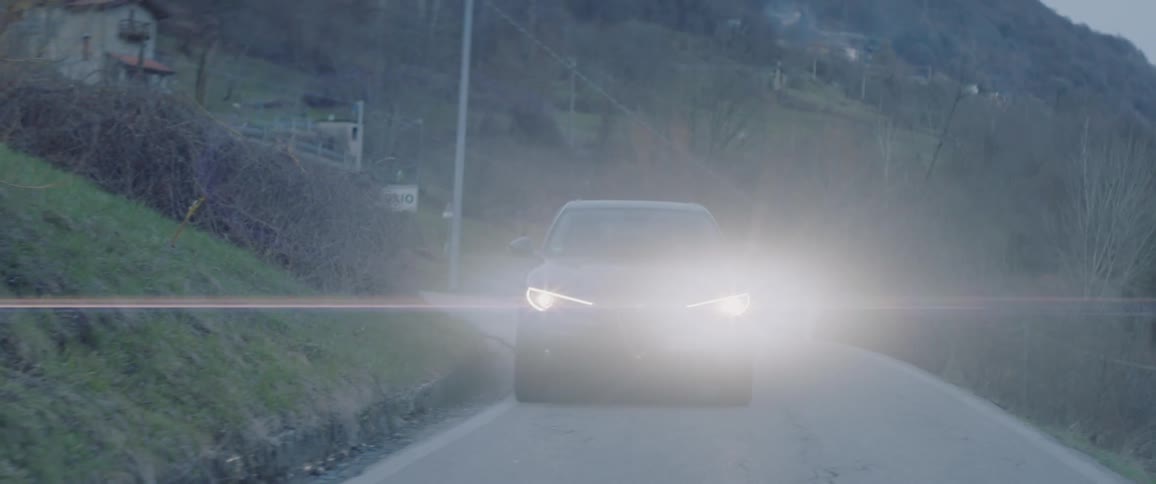 Couple Driving Up Mountain Road
