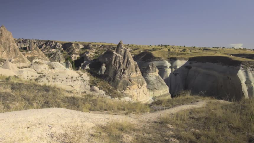 Rock formations stand in the wilderness
