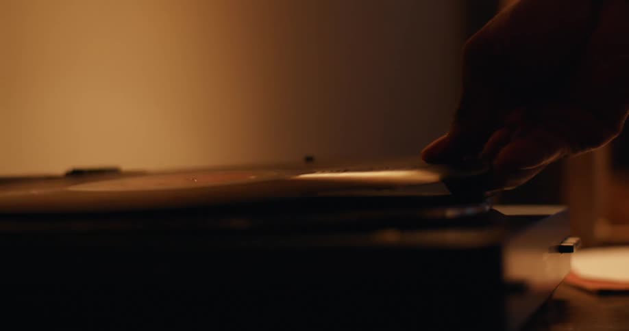 Long play record is placed on a record player