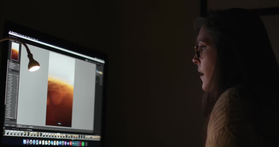 A woman working on her computer