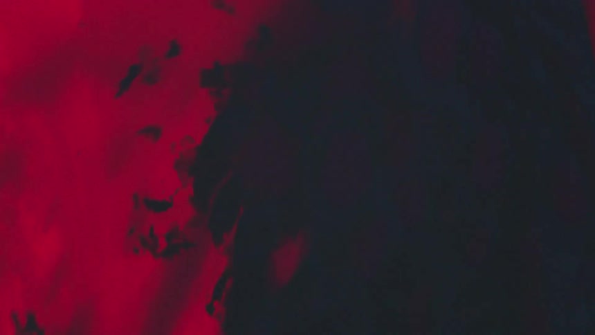 Abstract footage of liquid dyes mixing together