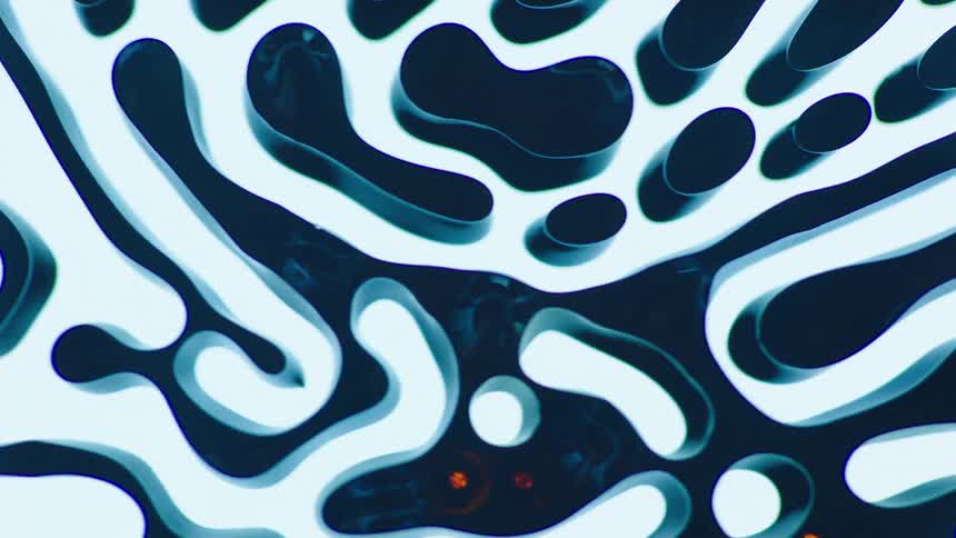 An unusual dark liquid that forms columns flows and swirls against a white background
