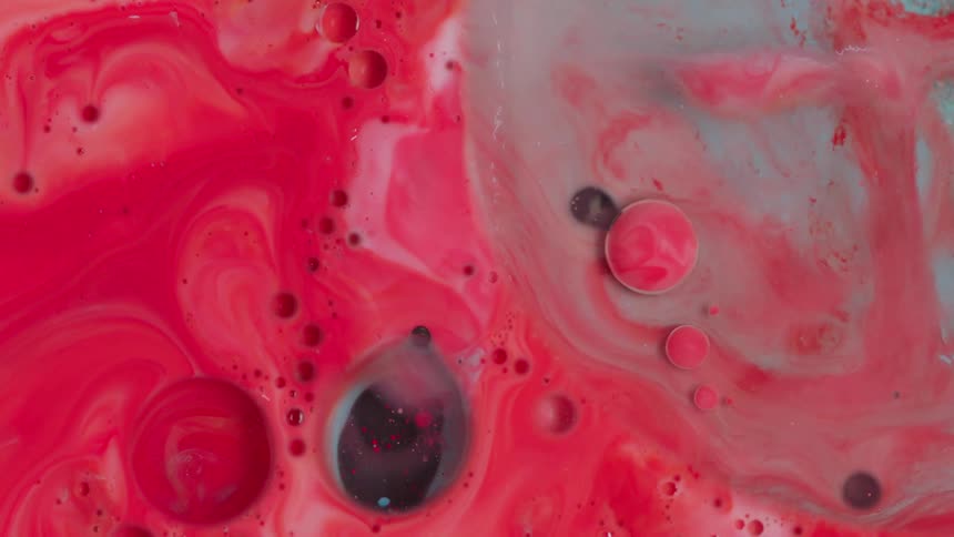 Flowing red and white paint