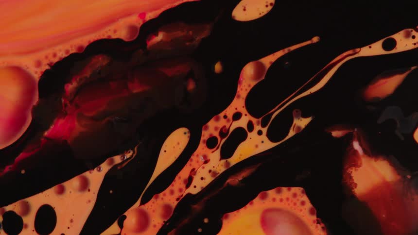 Liquid paints mixing together