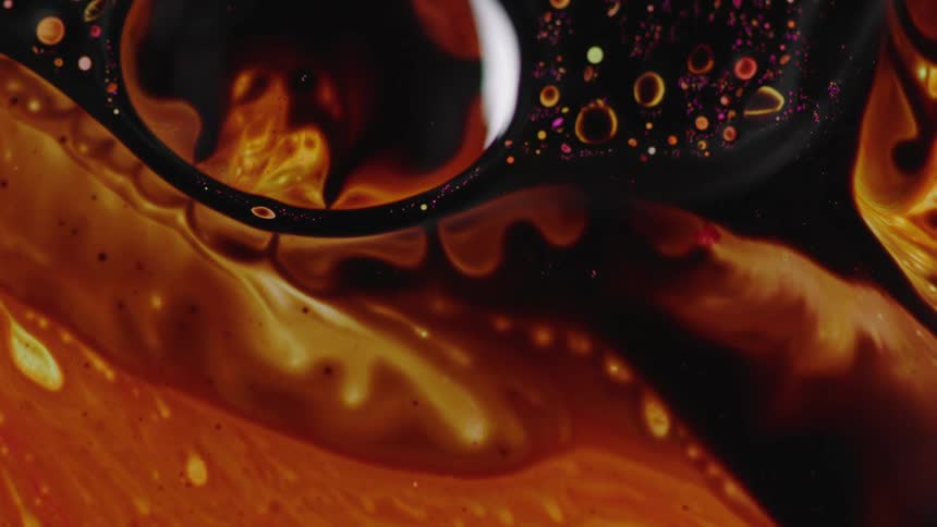 Black and brown liquid blends together