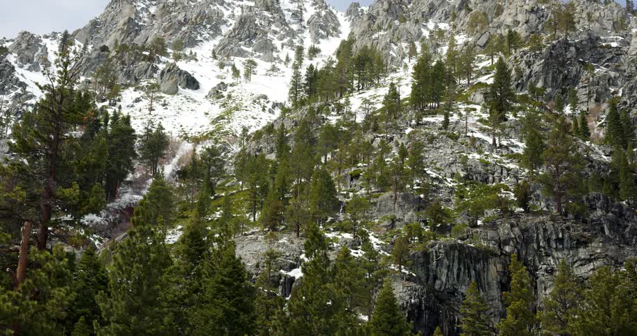 An aerial view of a mountain is displayed