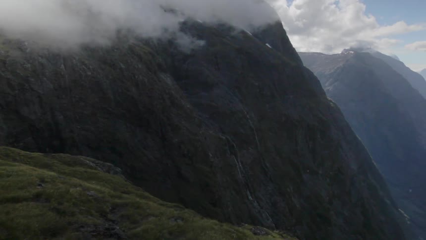 Aerial view of a cloud covered mountain range