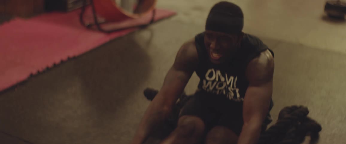 Man exercises in a gym